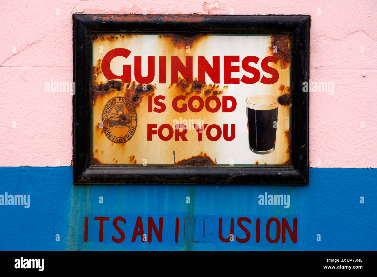 Old advertising sign for beer outside Dan Foley`s Pub in Annascaul, County Kerry, Ireland Europe Stock Photo
